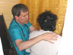 Dr. Younger caring for a patient
